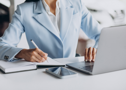 business-woman-working-office-computer 1